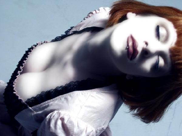 Theda FoXXX