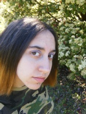 Bella - Me in my yard whenever I had my lip ring.