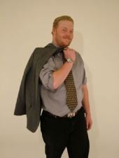 Michael Vencent - Me holding a dress jacket