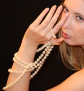 monkat1781 - hand on pearls