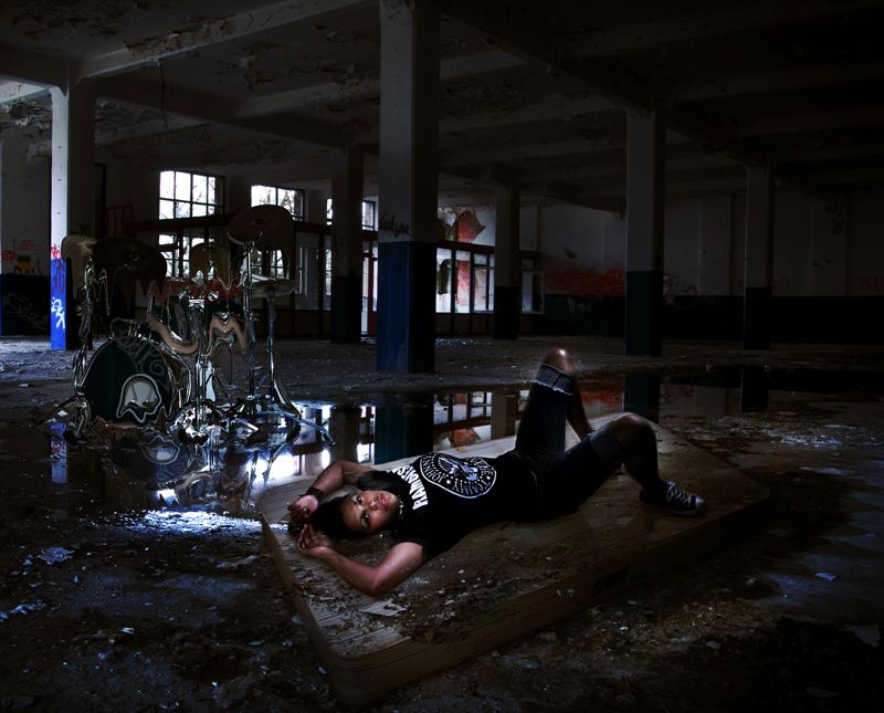 brittanymacc - brittany on the bed with a melting drumset in the backround
